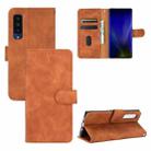 For Fujitsu Arrows NX9 F-52A Solid Color Skin Feel Magnetic Buckle Horizontal Flip Calf Texture PU Leather Case with Holder & Card Slots & Wallet(Brown) - 1