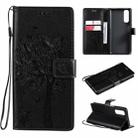 For OPPO Realme 7 Tree & Cat Pattern Pressed Printing Horizontal Flip PU Leather Case with Holder & Card Slots & Wallet & Lanyard(Black) - 1