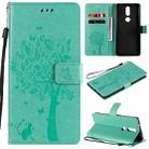 For Nokia 2.4 Tree & Cat Pattern Pressed Printing Horizontal Flip PU Leather Case with Holder & Card Slots & Wallet & Lanyard(Green) - 1