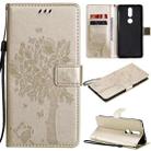 For Nokia 2.4 Tree & Cat Pattern Pressed Printing Horizontal Flip PU Leather Case with Holder & Card Slots & Wallet & Lanyard(Gold) - 1