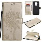 For Nokia 3.4 Tree & Cat Pattern Pressed Printing Horizontal Flip PU Leather Case with Holder & Card Slots & Wallet & Lanyard(Gold) - 1