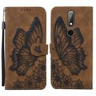 For Nokia 2.4 Retro Skin Feel Butterflies Embossing Horizontal Flip Leather Case with Holder & Card Slots & Wallet(Brown) - 1