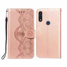 For Motorola Moto E(2020) / E7 Flower Vine Embossing Pattern Horizontal Flip Leather Case with Card Slot & Holder & Wallet & Lanyard(Rose Gold) - 1