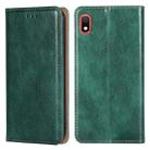 For Samsung Galaxy A10 PU + TPU Gloss Oil Solid Color Magnetic Horizontal Flip Leather Case with Holder & Card Slot & Wallet(Green) - 1