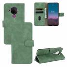 For Nokia 5.4 Solid Color Skin Feel Magnetic Buckle Horizontal Flip Calf Texture PU Leather Case with Holder & Card Slots & Wallet(Green) - 1