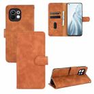 For Xiaomi Mi 11 Solid Color Skin Feel Magnetic Buckle Horizontal Flip Calf Texture PU Leather Case with Holder & Card Slots & Wallet(Brown) - 1