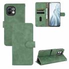 For Xiaomi Mi 11 Solid Color Skin Feel Magnetic Buckle Horizontal Flip Calf Texture PU Leather Case with Holder & Card Slots & Wallet(Green) - 1