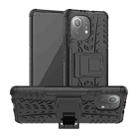 For Xiaomi Mi 11 Tire Texture Shockproof TPU+PC Protective Case with Holder(Black) - 1