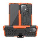 For Xiaomi Mi 11 Tire Texture Shockproof TPU+PC Protective Case with Holder(Orange) - 1