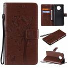 For Xiaomi Redmi Note 9 5G Tree & Cat Pattern Pressed Printing Horizontal Flip PU Leather Case with Holder & Card Slots & Wallet & Lanyard(Coffee) - 1