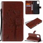 For LG K42 Tree & Cat Pattern Pressed Printing Horizontal Flip PU Leather Case with Holder & Card Slots & Wallet & Lanyard(Coffee) - 1