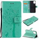 For LG K42 Tree & Cat Pattern Pressed Printing Horizontal Flip PU Leather Case with Holder & Card Slots & Wallet & Lanyard(Green) - 1