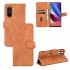 For Xiaomi Redmi K40 / K40 Pro Solid Color Skin Feel Magnetic Buckle Horizontal Flip Calf Texture PU Leather Case with Holder & Card Slots & Wallet(Brown) - 1