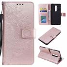 For Nokia 2.4 Totem Flower Embossed Horizontal Flip TPU + PU Leather Case with Holder & Card Slots & Wallet(Rose Gold) - 1