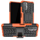 For Xiaomi Redmi Note 10 Tire Texture Shockproof TPU+PC Protective Case with Holder(Orange) - 1