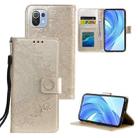 For Xiaomi Mi 11 Lite Totem Flower Embossed Horizontal Flip TPU + PU Leather Case with Holder & Card Slots & Wallet(Gold) - 1