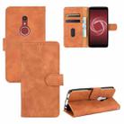 For Fujitsu Be4 Plus F-41B Solid Color Skin Feel Magnetic Buckle Horizontal Flip Calf Texture PU Leather Case with Holder & Card Slots & Wallet(Brown) - 1