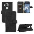 For Nokia 7.3 Solid Color Skin Feel Magnetic Buckle Horizontal Flip Calf Texture PU Leather Case with Holder & Card Slots & Wallet(Black) - 1