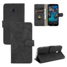 For Nokia C1 Plus Solid Color Skin Feel Magnetic Buckle Horizontal Flip Calf Texture PU Leather Case with Holder & Card Slots & Wallet(Black) - 1