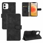 For iPhone 13 Pro Solid Color Skin Feel Magnetic Buckle Horizontal Flip Calf Texture PU Leather Case with Holder & Card Slots & Wallet (Black) - 1