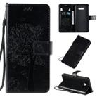 For LG G8X Tree & Cat Pattern Pressed Printing Horizontal Flip PU Leather Case with Holder & Card Slots & Wallet & Lanyard(Black) - 1