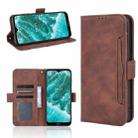 For Nokia C30 Skin Feel Calf Pattern Horizontal Flip Leather Case with Holder & Card Slots & Photo Frame(Brown) - 1