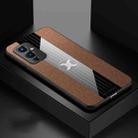 For OnePlus 9 XINLI Stitching Cloth Texture Shockproof TPU Phone Case(Brown) - 1