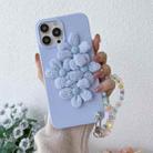 For iPhone 13 Four Flowers Hand Strap Phone Case(Light Purple) - 1