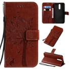 For Xiaomi Redmi 8 Tree & Cat Pattern Pressed Printing Horizontal Flip PU Leather Case with Holder & Card Slots & Wallet & Lanyard(Coffee) - 1