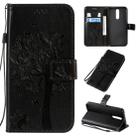 For Xiaomi Redmi 8 Tree & Cat Pattern Pressed Printing Horizontal Flip PU Leather Case with Holder & Card Slots & Wallet & Lanyard(Black) - 1