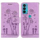 For Motorola Moto E20 / E30 / E40 Embossing Rose Couple Leather Phone Case(Purple) - 1