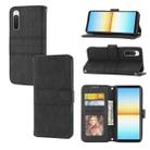 For Sony Xperia 10 IV Embossed Striped Magnetic Buckle Horizontal Flip Phone Leather Case(Black) - 1