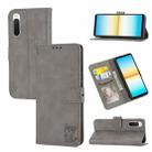 For Sony Xperia 10 IV Embossed Happy Cat Pattern Leather Phone Case(Grey) - 1