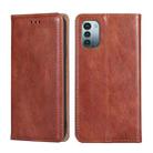 For Nokia G21 / G11 Gloss Oil Solid Color Magnetic Flip Leather Phone Case(Brown) - 1