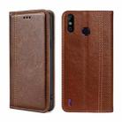 For Infinix Smart 4 Grid Texture Magnetic Flip Leather Phone Case(Brown) - 1