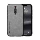 For Xiaomi Redmi K20 Skin Feel Magnetic Leather Back Phone Case(Light Grey) - 1