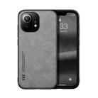 For Xiaomi Mi 11 Skin Feel Magnetic Leather Back Phone Case(Light Grey) - 1
