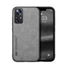 For Xiaomi 12 Pro Skin Feel Magnetic Leather Back Phone Case(Light Grey) - 1