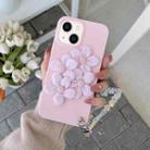 For iPhone 14 Four Flowers Hand Strap Phone Case (Light Pink) - 1