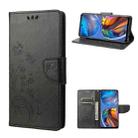 For Motorola Moto E32 Butterfly Flower Pattern Horizontal Flip Leather Phone Case with Card Slot & Holder(Black) - 1