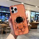 For iPhone 14 Pro Plating Astronaut Holder TPU Phone Case(Orange Red) - 1