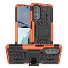 For Motorola Moto G62 5G Tire Texture TPU + PC Phone Case with Holder(Orange) - 1