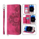 For iPhone 14 Pro Skin-feel Flowers Embossed Wallet Leather Phone Case(Wine Red) - 1