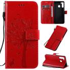 For Galaxy A21 Tree & Cat Pattern Pressed Printing Horizontal Flip PU Leather Case with Holder & Card Slots & Wallet & Lanyard(Red) - 1
