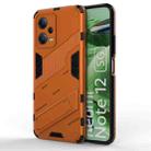 For Xiaomi Redmi Note 12 China / Note 12 5G India Punk Armor 2 in 1 PC + TPU Phone Case with Invisible Holder(Orange) - 1