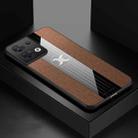 For OPPO Reno8 XINLI Stitching Cloth Textue Shockproof TPU Phone Case(Brown) - 1