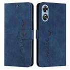 For OPPO A17 Skin Feel Heart Embossed Leather Phone Case(Blue) - 1