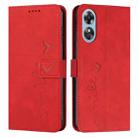 For OPPO A17 Skin Feel Heart Embossed Leather Phone Case(Red) - 1