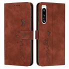 For Sony Xperia 5 IV Skin Feel Heart Embossed Leather Phone Case(Brown) - 1