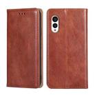 For Fujitsu Arrows N F-51C Gloss Oil Solid Color Magnetic Leather Phone Case(Brown) - 1